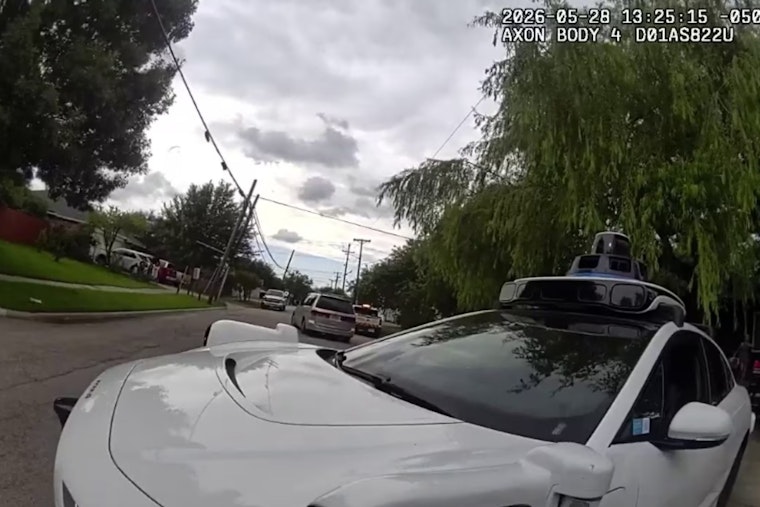 Dallas Constable Shoves Stalled Waymo From Firefighters' Lane In Deadly Blast Chaos