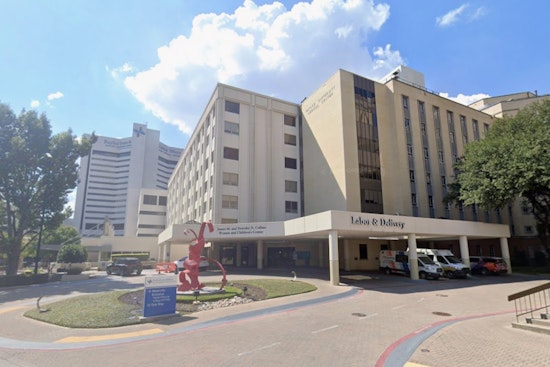 Dallas Hospital Cop Wades Into Flood To Haul Stranded Drivers To Safety