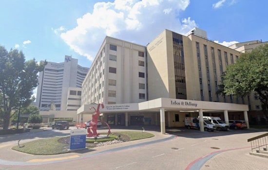 Dallas Hospital Cop Wades Into Flood To Haul Stranded Drivers To Safety