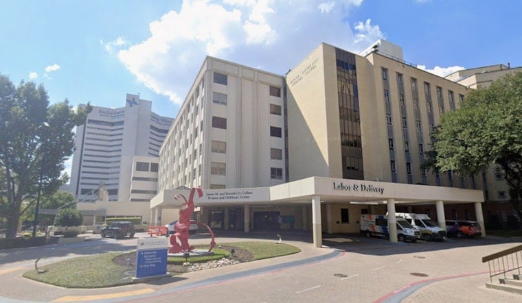 Dallas Hospital Cop Wades Into Flood To Haul Stranded Drivers To Safety