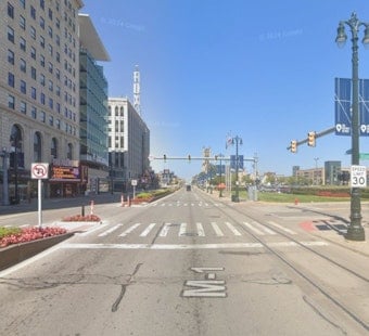 DDOT Bus Slams Turning Car Outside Comerica, Sends Four To Hospital