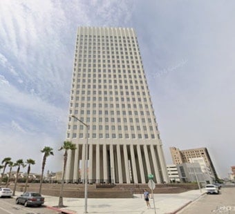 Downtown Drama As Galveston’s One Moody Plaza Changes Hands At Auction