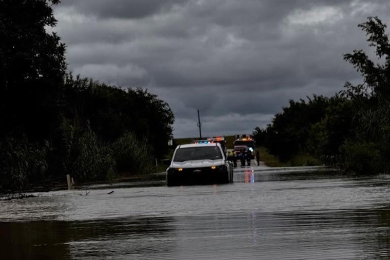 Driver Rescued After Vehicle Submerged Near Manor