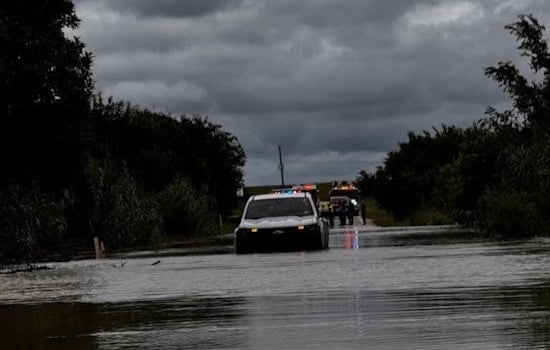 Driver Rescued After Vehicle Submerged Near Manor