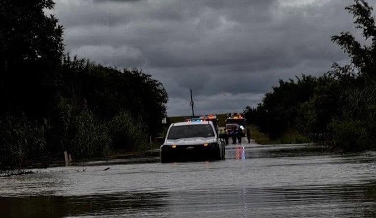 Driver Rescued After Vehicle Submerged Near Manor