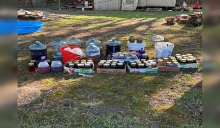Faulty Blinker Leads Whiteville Cops To 18 Gallons Of Moonshine Stash