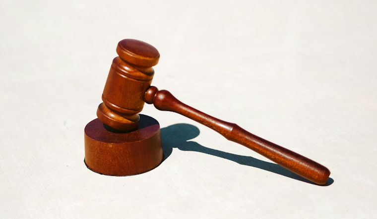 Feds Say Baltimore-Area CFO Hijacked Co-Workers' Paychecks and Fooled Immigration