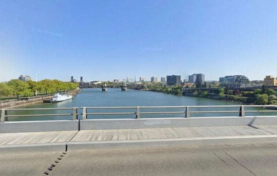 Fireboat Responds As Person Perches On Morrison Bridge Railing