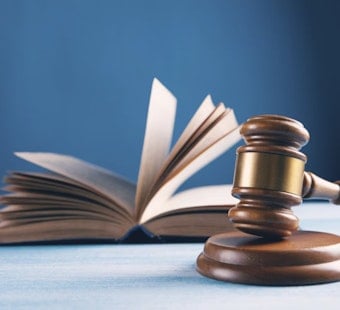Santa Muerte Altar Sinks Jail Job, Scores Man $300K From Bexar County