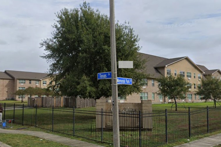 Algiers Blaze Rescue: Firefighter Hauls Woman From Second-Floor Window