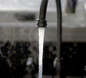 Belmont Hikes Water Bills To Climb Out Of 'Distressed' Doghouse