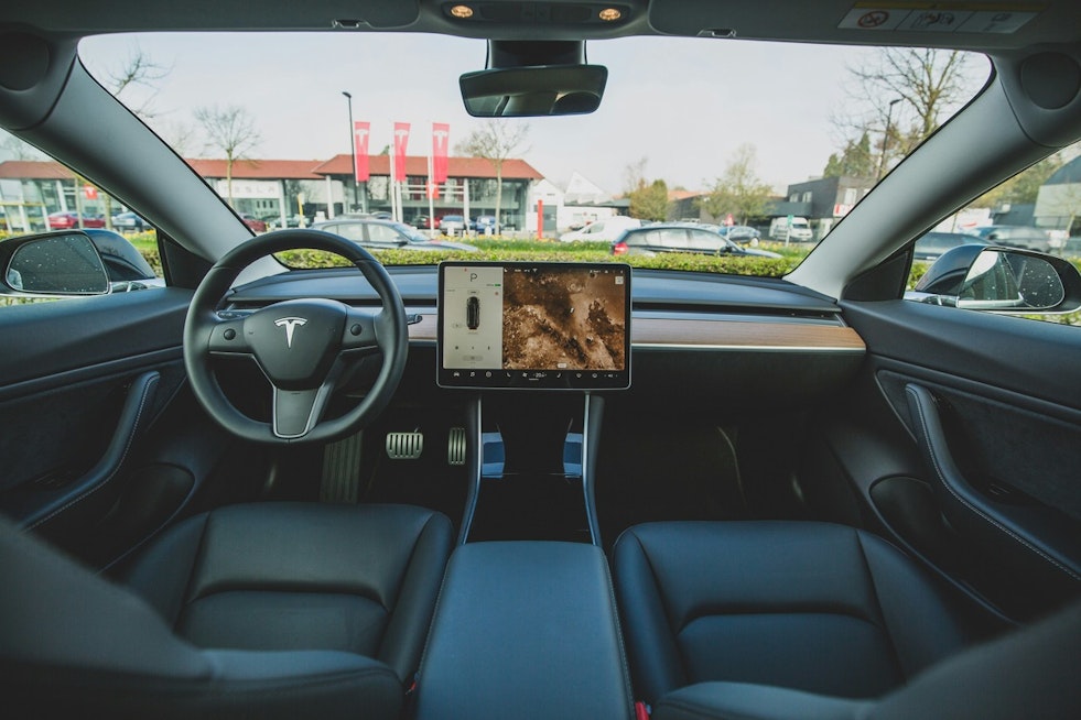 Cybercabs Creep Into Queen City Lot As Tesla Eyes Robotaxi Turf
