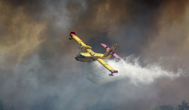 Firefighting Plane Plunges Into Silver Jack Reservoir As Gold Mountain Blaze Rages