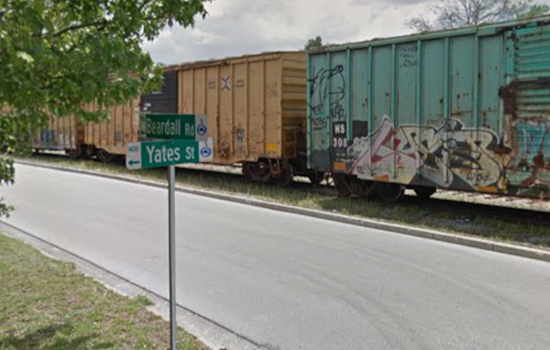 Freight Train Jumps Track, Leaves Leaning Boxcar In College Park