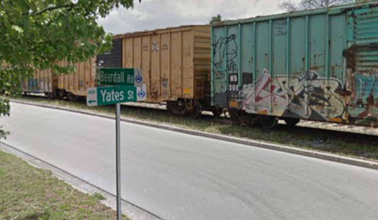 Freight Train Jumps Track, Leaves Leaning Boxcar In College Park