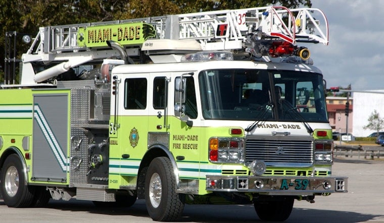 Kendall Neighbors Bolt Into Action as Firefighters Save Dozens of Dogs from Roof Blaze