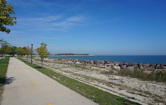 Lake Michigan Ice Bath Sends Holland And Ludington Beachgoers Running