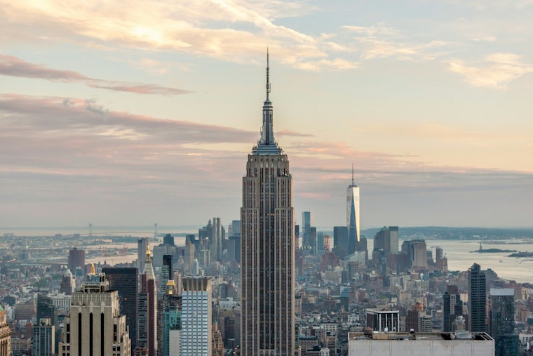 Masked Duo Scales Empire State Spire, Unfurls Peace Banner Over Midtown