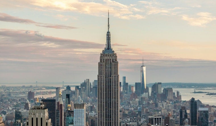 Masked Duo Scales Empire State Spire, Unfurls Peace Banner Over Midtown