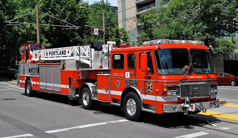 Portland Firefighters Investigate Burning Debris Pile Near Structure
