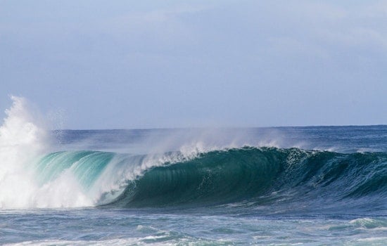 Sneaky South Swell Strips Orange County Beaches to the Bone