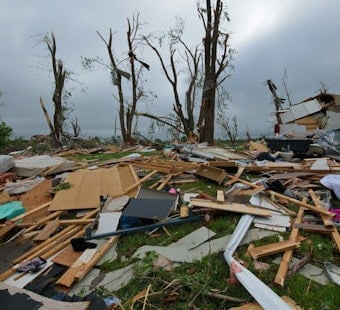 Storm-Battered Illinois Gets Tax Break as Pritzker Hits Pause on Penalties