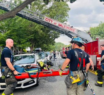 Two-Alarm Hampden Row Home Blaze Rocks W. 37th Street