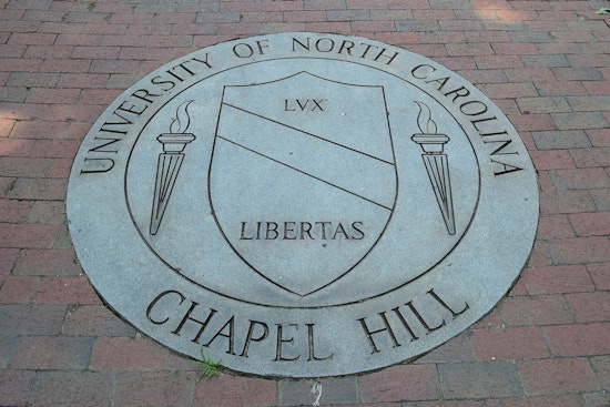 Mystery in Chapel Hill, UNC Football GM Michael Lombardi Suddenly Put on Paid Leave
