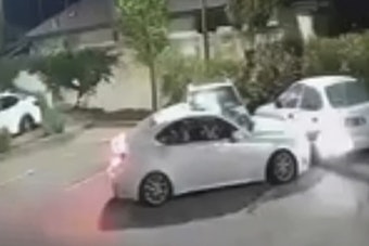 White Infiniti Wrecks Petaluma Taco Bell Lot, Screeches Off Into Night
