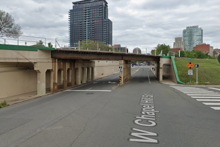 Person Falls From Durham Rail Bridge Onto Chapel Hill Street as Train Sounds