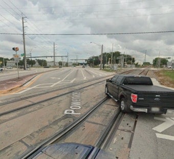 Amtrak Train Slams Into Stalled Car in Oakland Park, Sparking Fire Near Notorious Crossing