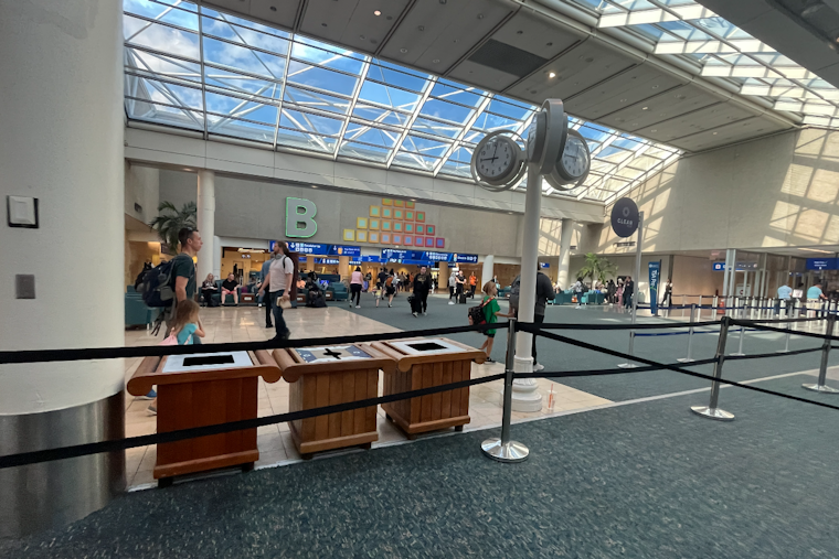 Annie The Astronaut Lands At MCO As Orlando Airport's First Live Mascot