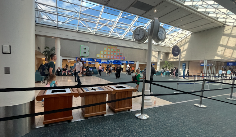 Annie The Astronaut Lands At MCO As Orlando Airport's First Live Mascot