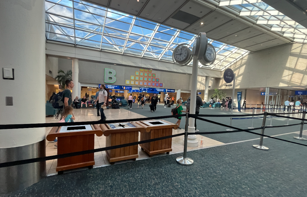 Annie The Astronaut Lands At MCO As Orlando Airport's First Live Mascot
