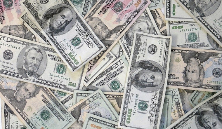BMW Courier Busted in Delafield After Hauling $277K in Alleged Investment Scam