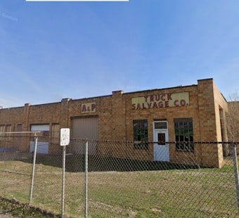 Burned OKC Scrapyard Across From Scissortail Park Sells for $4.1M, Becomes Apartments
