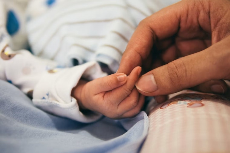 Carlsbad Navy Baby Given 20% Odds Now Fights On With AI-Built Gene Therapy Hope