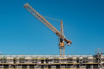 Crane Arrives at Tam Valley's 156 Shoreline Site as Permits Still Lag