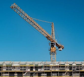 Crane Arrives at Tam Valley's 156 Shoreline Site as Permits Still Lag