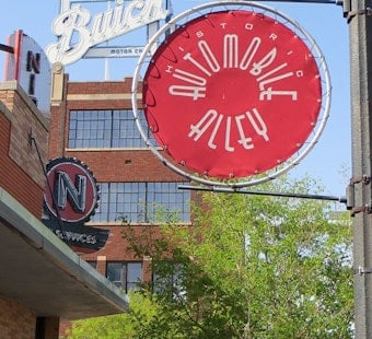 Goofy Dragons, Space-Age Skylines Land on OKC's Automobile Alley