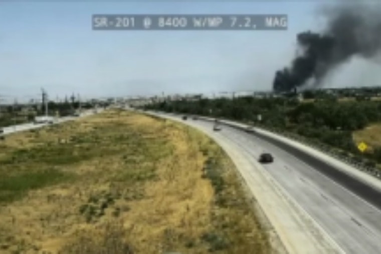 Fast-Moving Brush Fire Along SR-201 in Magna Chokes Highway With Smoke