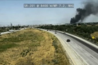 Fast-Moving Brush Fire Along SR-201 in Magna Chokes Highway With Smoke