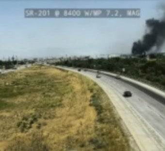 Fast-Moving Brush Fire Along SR-201 in Magna Chokes Highway With Smoke