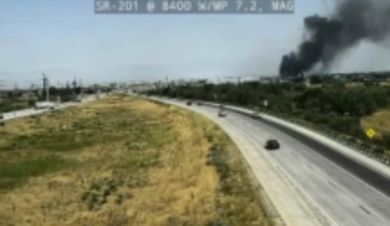 Fast-Moving Brush Fire Along SR-201 in Magna Chokes Highway With Smoke