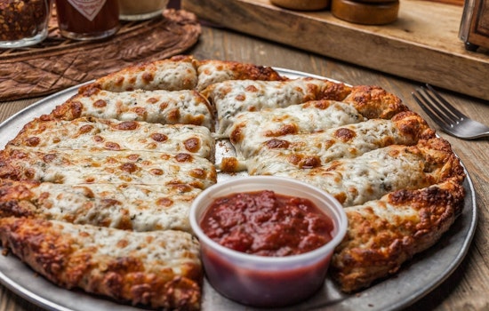 From Ashes to Slices: Mandeville’s McClain’s Pizzeria Reopens With Charred Cookbook, New Bar