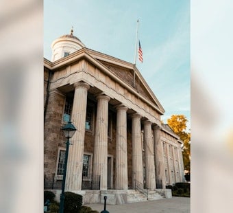 Georgetown Woman, 39, Faces Court After Fleeing Scene of Bus Stop Crash