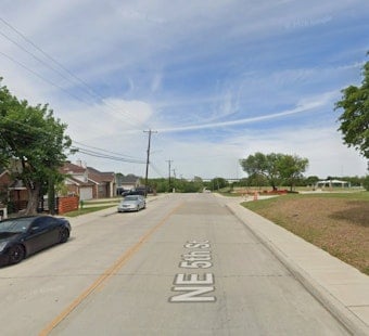 Grand Prairie Suburban Slams Parked Trash Truck, Killing Driver and Teen