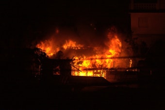 House Fire Erupts on Stoneman Street in Lakeland Village, Flames Spread to Brush