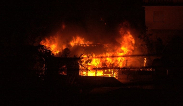 House Fire Erupts on Stoneman Street in Lakeland Village, Flames Spread to Brush