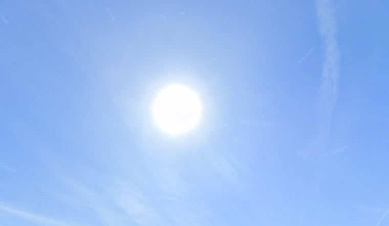 Houston Sizzles: 99-Degree Heat, Ozone Alert and Storm Tease